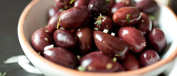 A boll of with black olives kamalata.