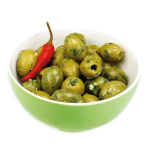 A boll of with green olives and bread.